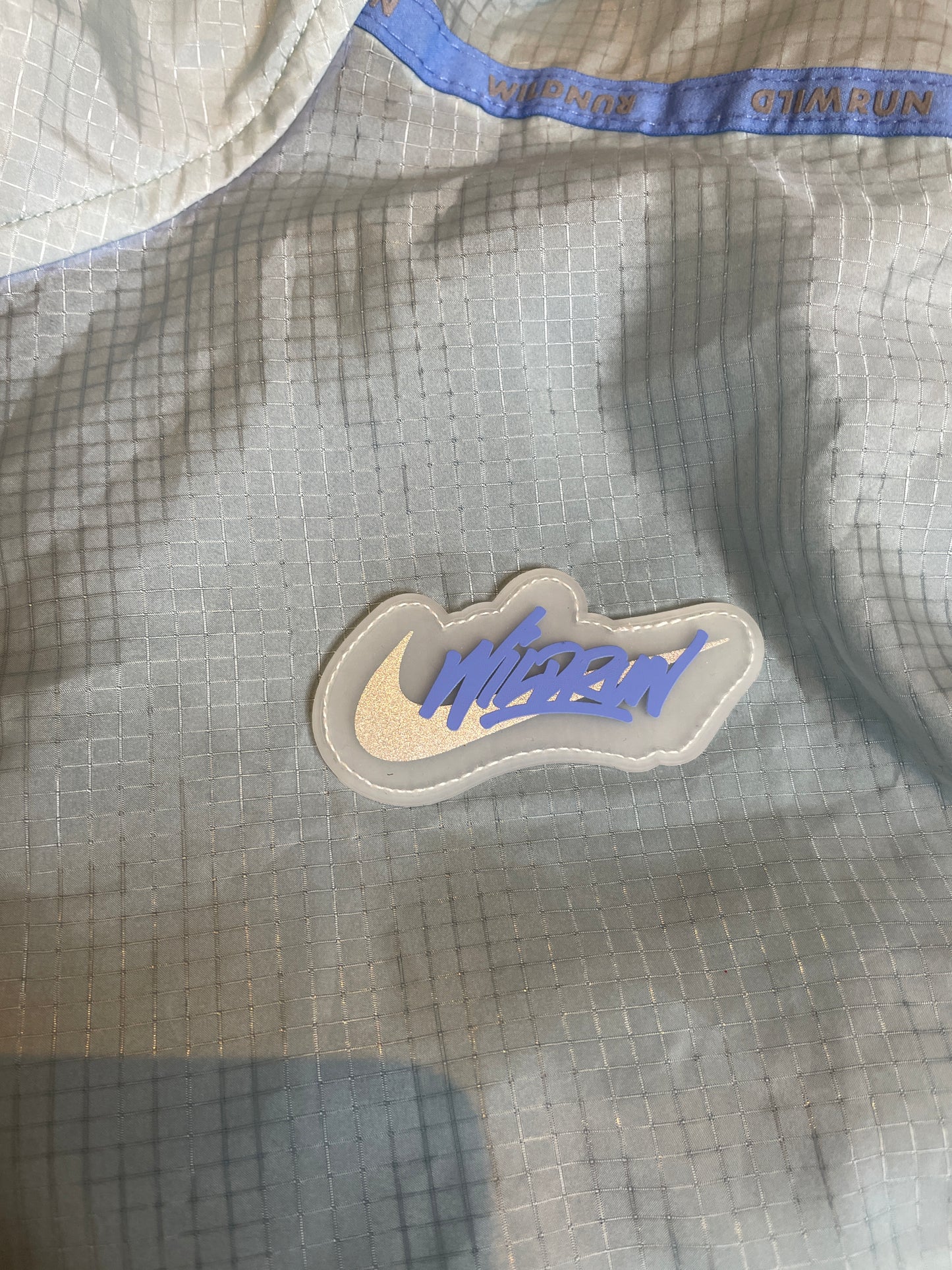 Nike Wild Run baby blue windbreaker