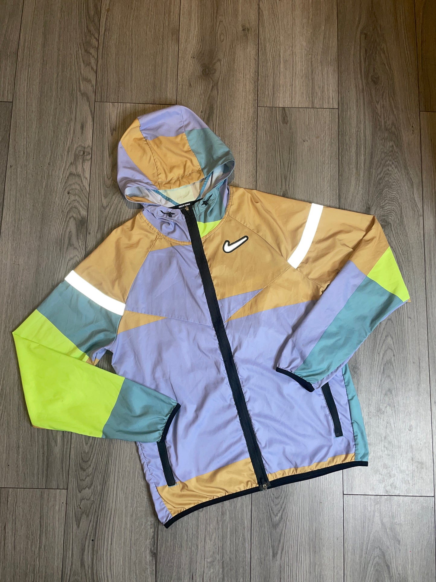 Nike Wild-Run Patchwork windbreaker neon