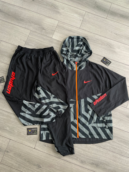 Nike “Ekiden” Tracksuit 🍊 (L)